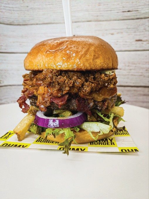 Oh My Burger loaded burger stacked with crispy toppings